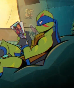 leo concentrating on reading a comic.