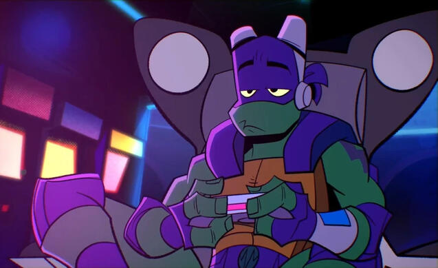 donnie gaming with a neutral expression.